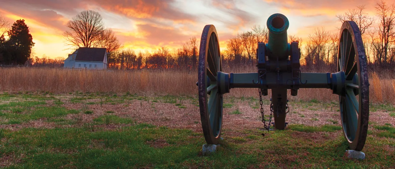 Photograph of a cannon with a vibrant sunset in the background at Gaines' Mill Battlefield, Hanover County, Va.