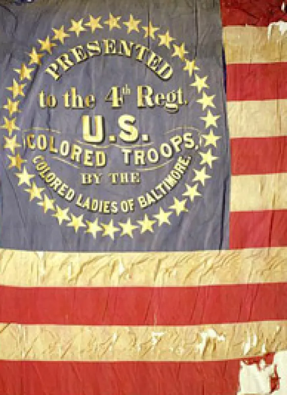 The remnants of the tattered flag of the 4th United States Colored Troops.