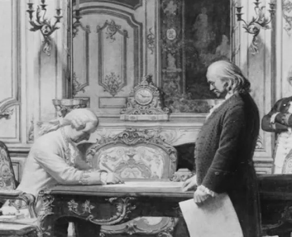 Historical print depicting American and French representatives signing the Treaties of Amity and Commerce and Alliance in Paris in 1778.